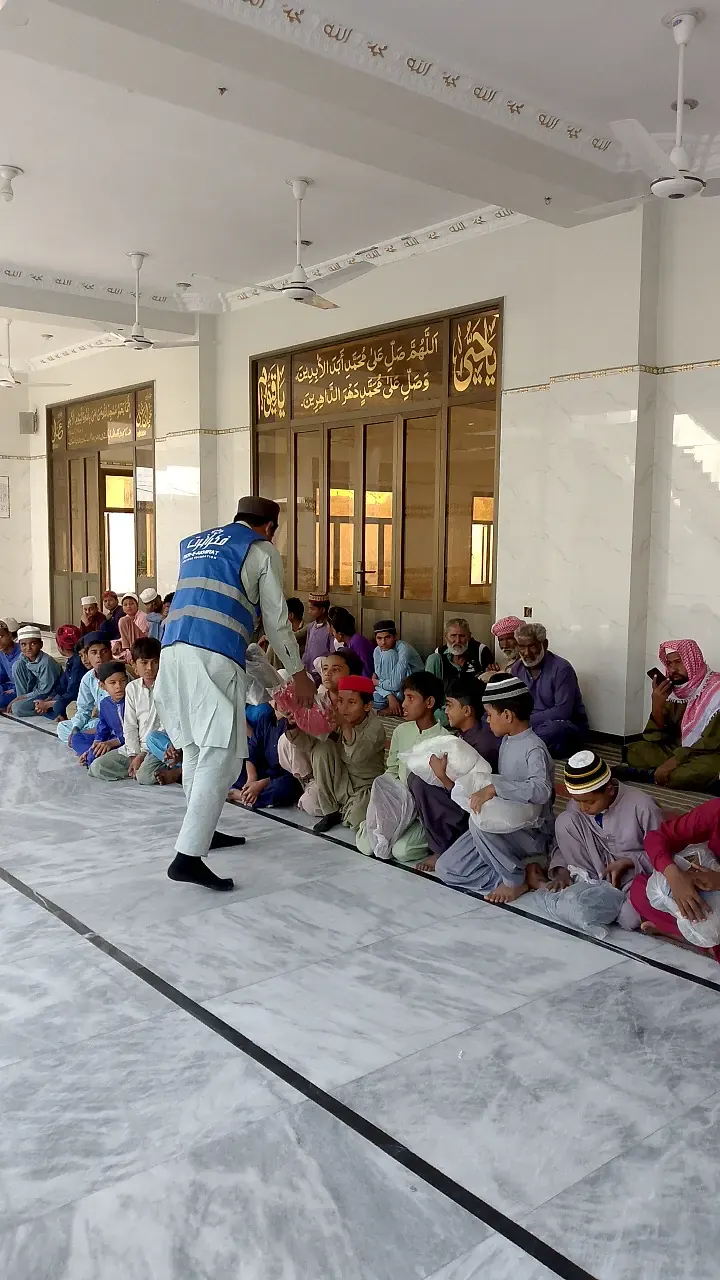 Children Receiving Packs at the Masjid
